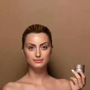 adult-woman-presenting-skin-care-product_23-2148272549